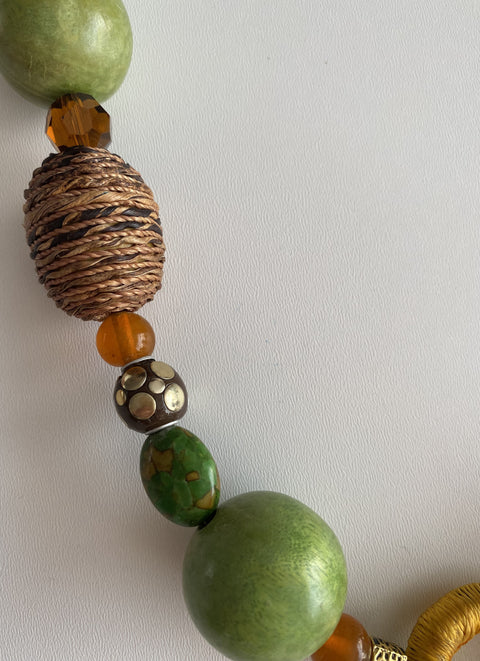 Lange ketting met aparte kralen