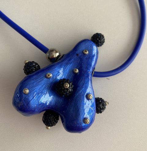 Ketting met handgemaakte oasis hanger ( veder licht)