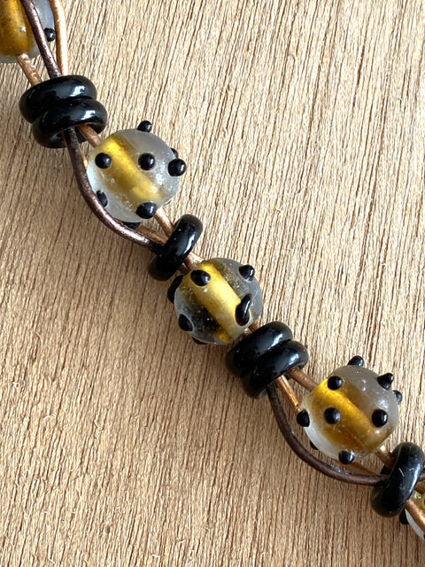 Lange ketting met mooie handgemaakte lampwork kralen