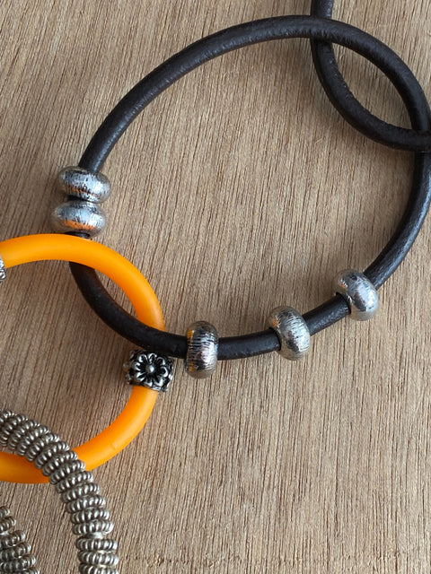 Blikvang in bruin en oranje