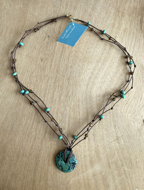 Ketting met turquois donut