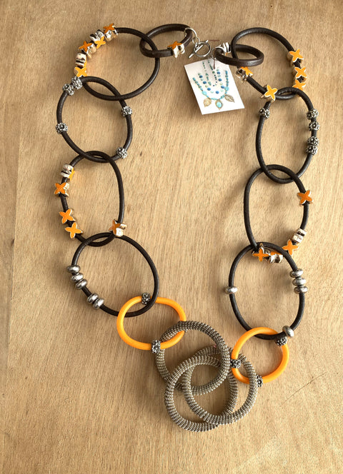 Blikvang in bruin en oranje