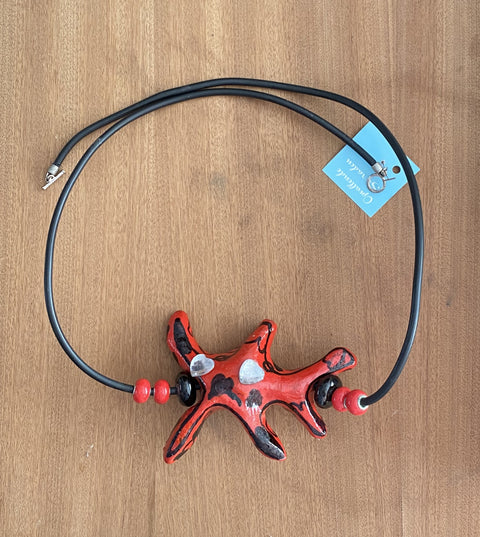 Blikvang: ketting met grote hanger van oasis. Super licht!!
